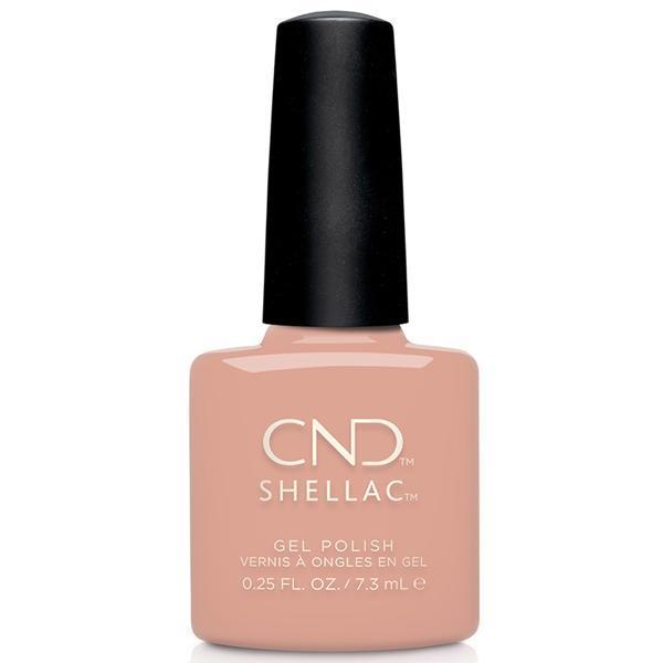 Creative Nail Design Shellac Baby Smile gel nail polish in soft pastel yellow, glossy finish, applied on neatly manicured nails.