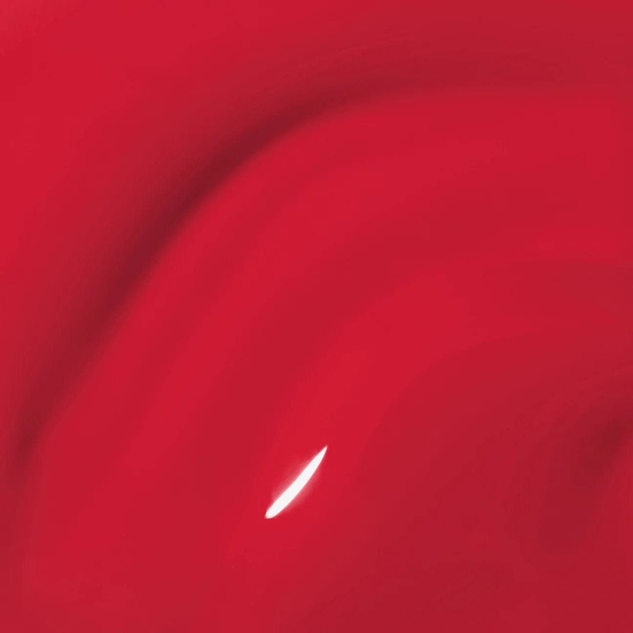 Aprés Nail Aprés Gel Color Polish Just Chili Out in vibrant red-orange shade, showcasing smooth, glossy finish on nails.