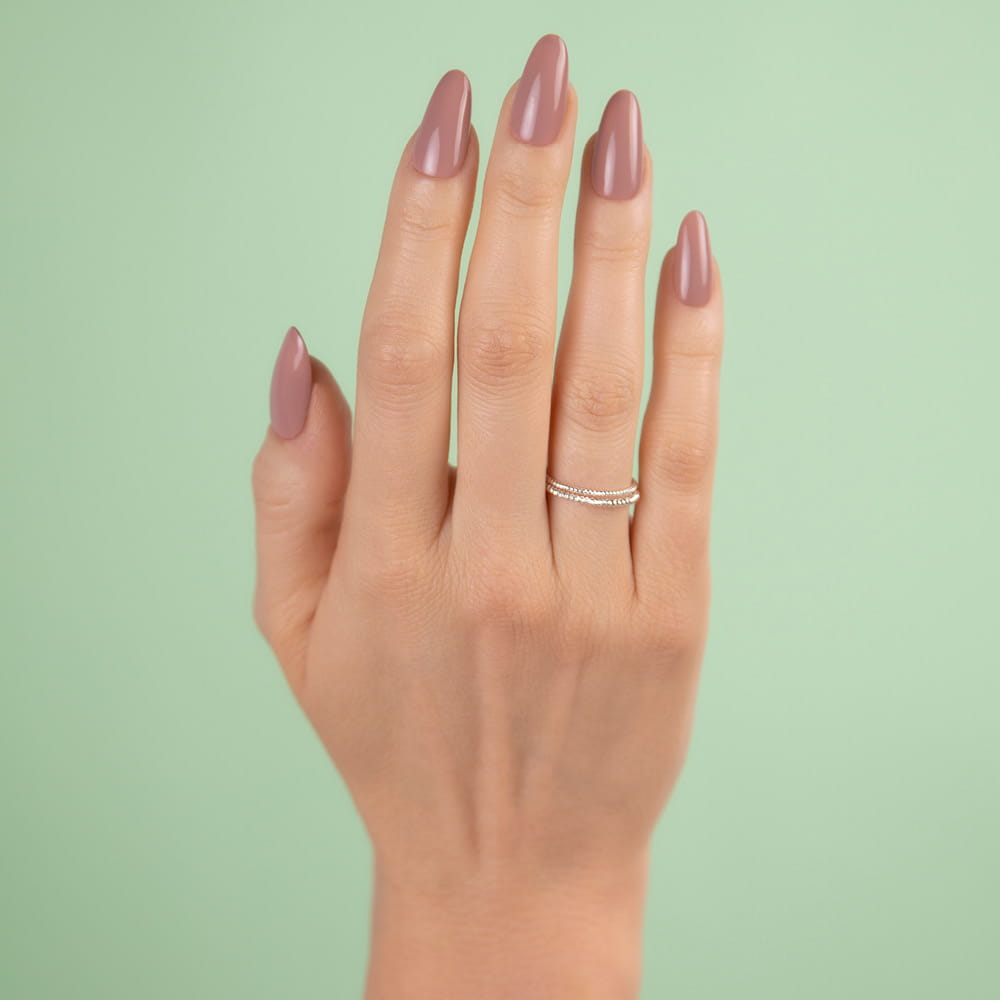Creative Nail Design Shellac gel nail polish in We Want Mauve on manicured nails with a smooth mauve finish.