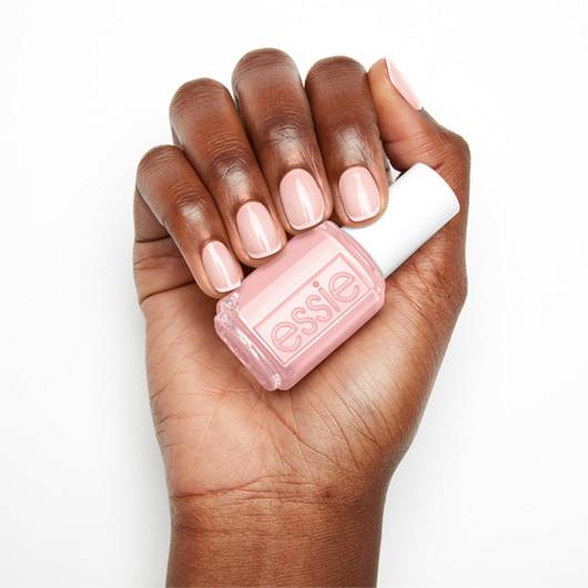 Essie Nail Lacquer in Hi Maintenance #100, a vibrant pink nail polish bottle with a white cap and colorful label.