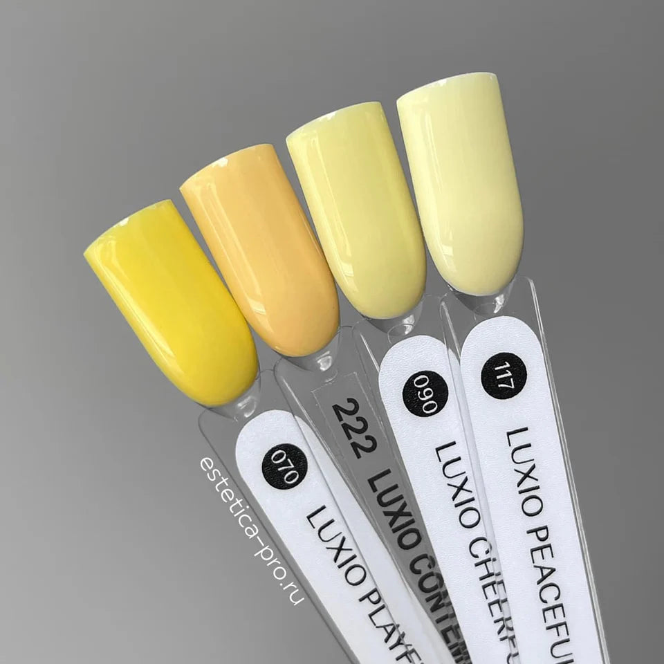 Luxio Soak-Off Gel Polish Cheerful 15ml bottle with colorful label and cap, displayed on a neutral background.