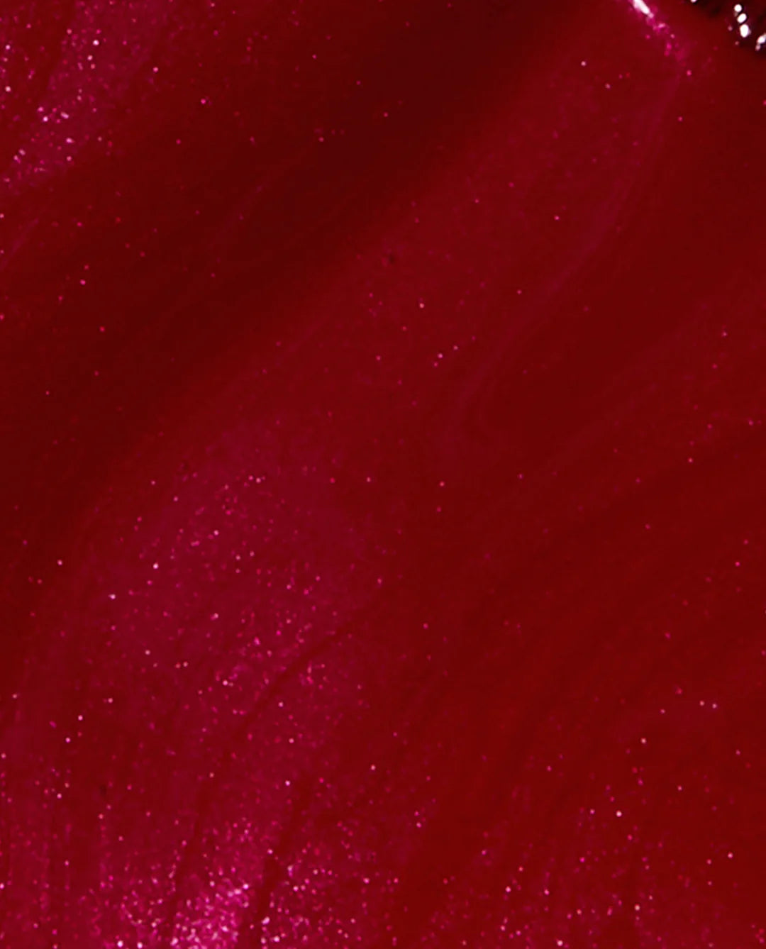 Swatch of Opi Intelli GelColor Red GCL72 gel nail polish with a brush showing vibrant red color and smooth texture.