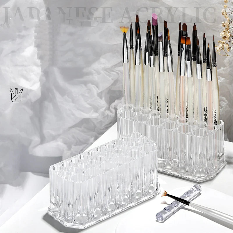 UNS 26-hole acrylic nail brush holder for nail art, with multiple compartments for organizing nail tools and brushes.