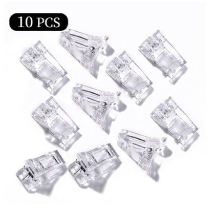 Set of 10 acrylic nail tips clips from Essentials & Self Care, plastic extension clamps for quick nail art extension.