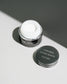 Luxio Akzéntz Pro-Formance Control Ultra white acrylic nails tips, 0.25 oz, displayed in a clear container with natural lighting.