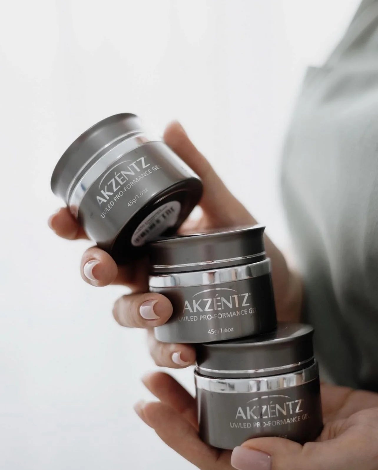 Luxio Akzéntz Pro Formance Trinity Shade SW2 UV/LED soak-off gel polish in 0.25oz bottle, with a smooth, glossy finish.