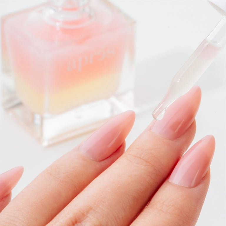 Aprés Nail Cuticle Oil gel system with coconut, sage, and jasmine for nourishing and moisturizing cuticles.