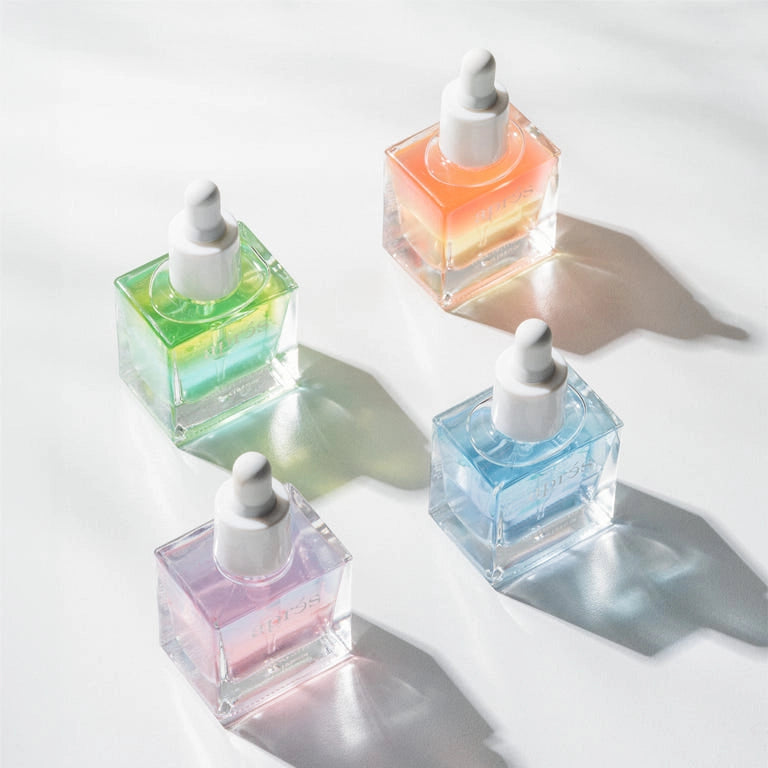 Aprés Nail Cuticle Oil Gel System in Coconut, Sage, and Jasmine with a winter-themed packaging design.