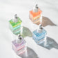 Aprés Nail Cuticle Oil Gel System in Coconut, Sage, and Jasmine with a winter-themed packaging design.