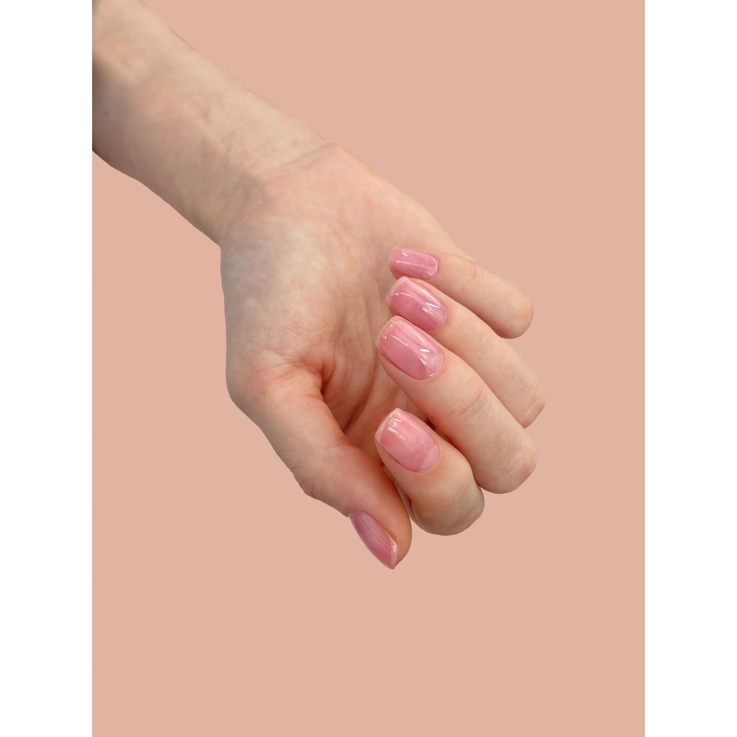 CND Plexigel Color Builder in Clearly Pink Sheer, 0.5oz, showing the gel in a small jar with a pink tint for nail extensions.