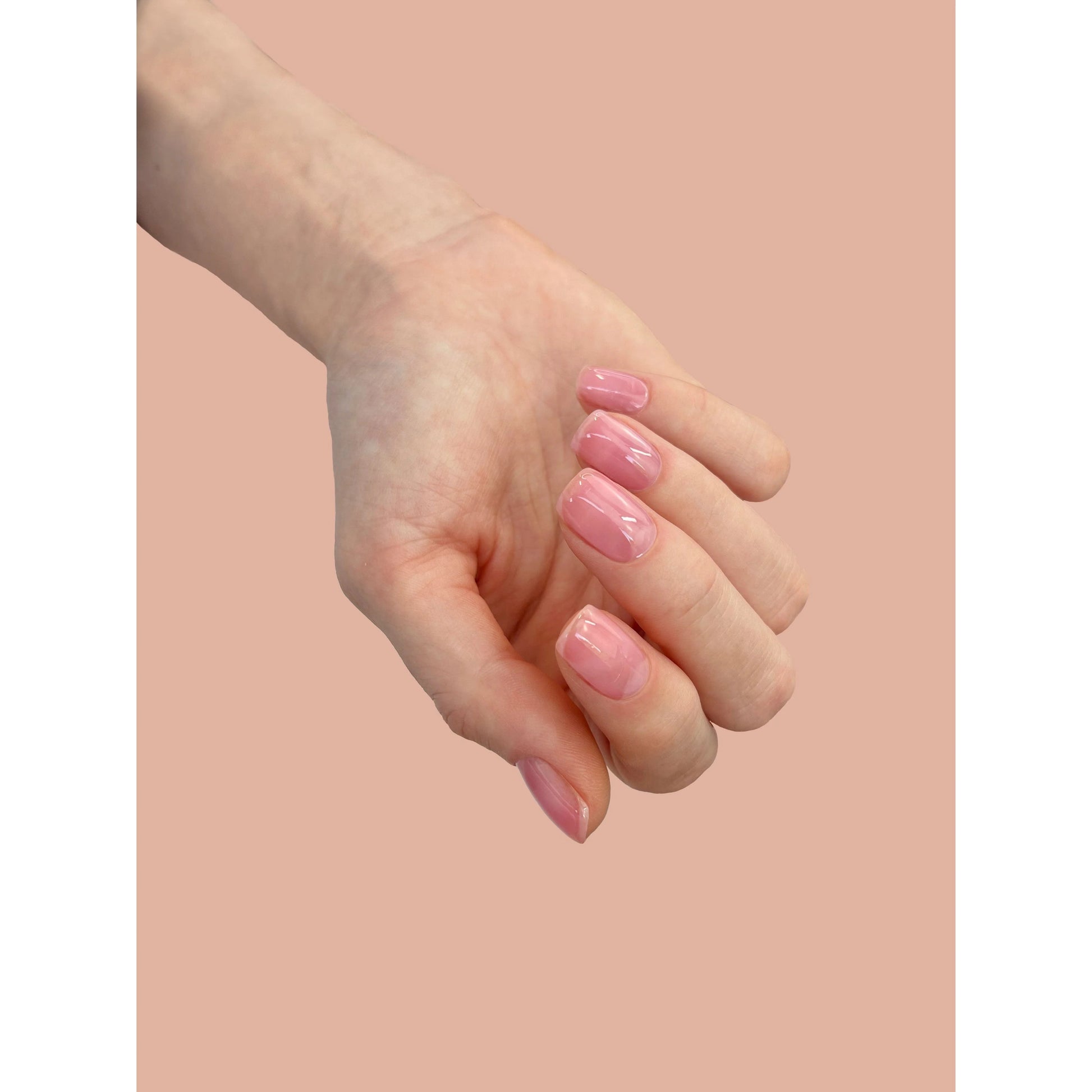 CND Plexigel Color Builder in Clearly Pink Sheer, 0.5oz, showing the gel in a small jar with a pink tint for nail extensions.