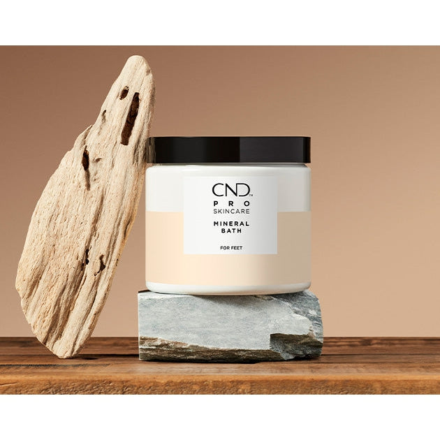 CND Pro Skincare mineral bath product with natural mineral ingredients in a stylish container.