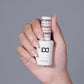 DND Daisy Gel Duo Bare Neutral #2345 gel nail polish and lacquer set, featuring a soft, neutral nail color on a clear background.