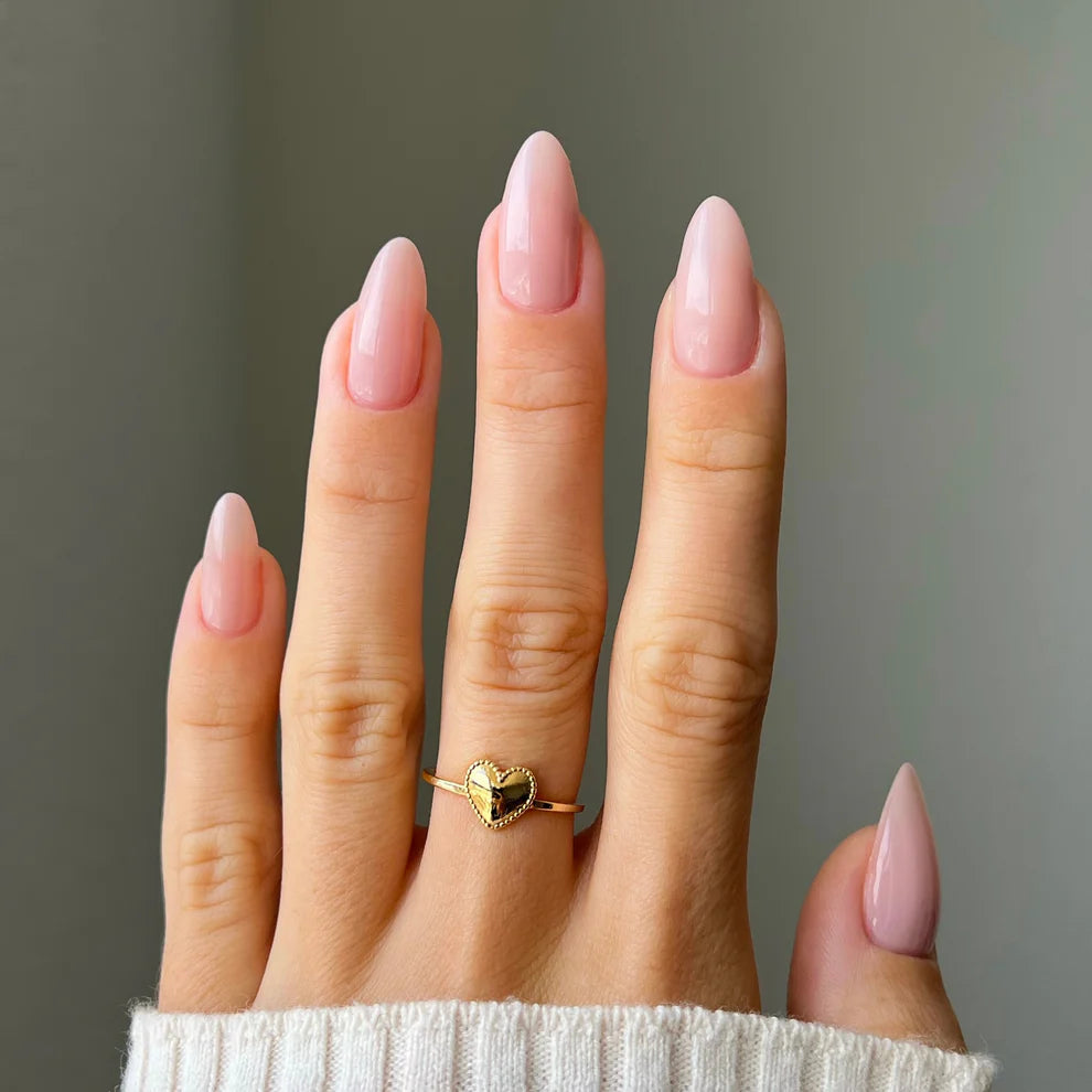 Swatch of DND Daisy Gel Duo in Bare Neutral #2345 showing a soft, neutral gel nail polish and lacquer color.