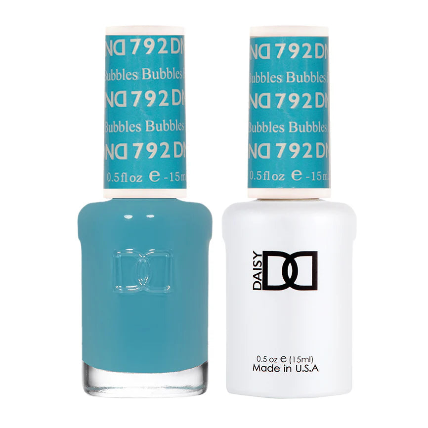 DND Daisy Gel Duo Bubbles #792 with pastel pink and white gel nail polish bottles on a white background