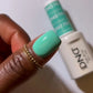 DND Daisy Gel Duo Carousel #787 showing a swatch of pink gel nail polish and lacquer on a nail tip.