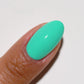 Swatch of DND Daisy Gel Duo Carousel #787 featuring vibrant gel nail polish and lacquer in bright daisy yellow shade