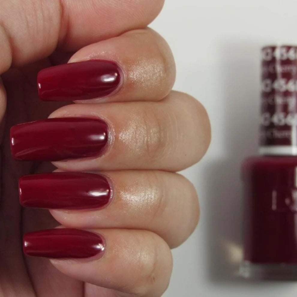 Swatch of DND Daisy Gel Duo Cherry Berry #456 featuring vibrant cherry berry gel nail polish and lacquer on nails.