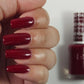 Swatch of DND Daisy Gel Duo Cherry Berry #456 featuring vibrant cherry berry gel nail polish and lacquer on nails.