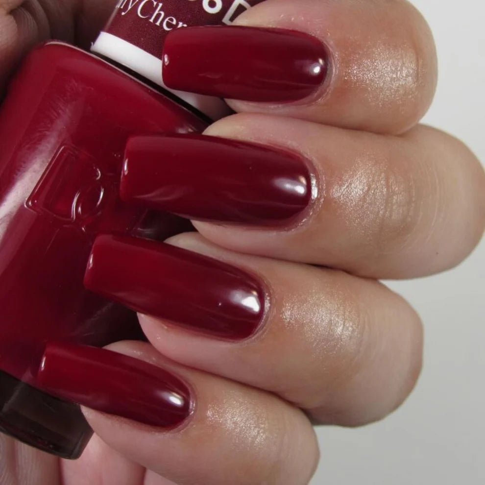 DND Daisy Gel Duo Cherry Berry #456 gel nail polish and lacquer swatch showing vibrant pink and deep red shades on nails