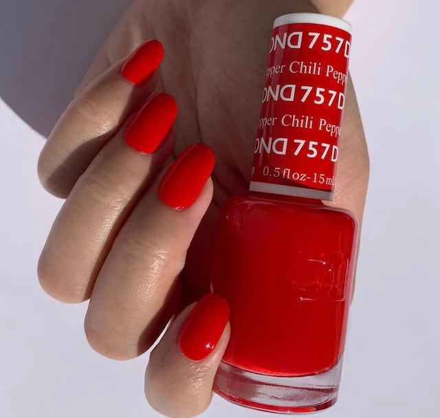 DND Daisy Gel Duo in Chili Pepper shade, featuring gel nail polish and lacquer bottles with vibrant red color and sleek packaging.