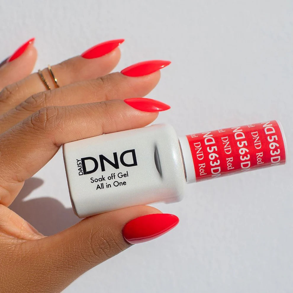 Swatch of DND Daisy Gel Duo in Red #563, featuring a vibrant gel nail polish and lacquer finish.