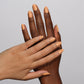 DND Daisy Gel Duo Foxy Sunset #994 with vibrant orange and yellow gel nail polish and lacquer, glossy finish, on a neutral background.