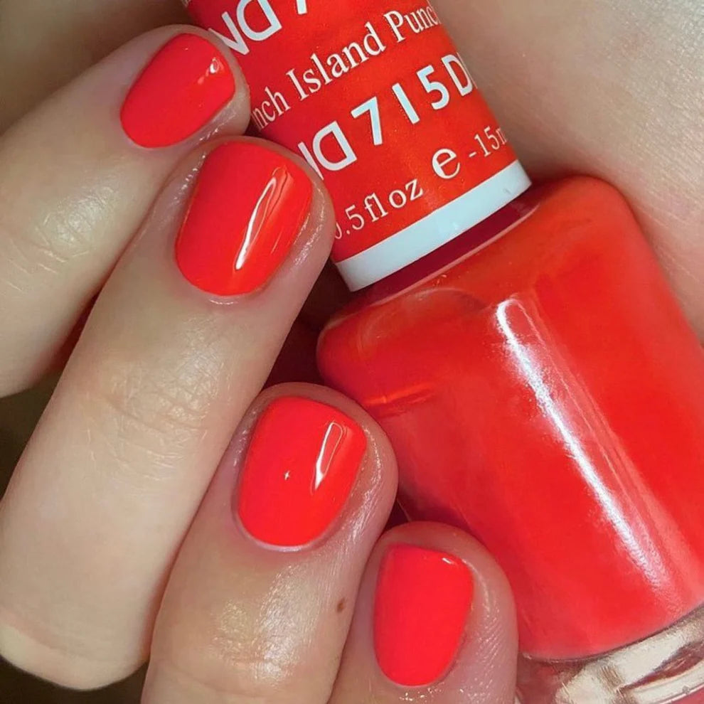 Swatch of DND Daisy Gel Duo Island Punch #715 featuring vibrant gel nail polish and lacquer in a bright, tropical pink shade.