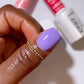DND Daisy Gel Duo in Kazoo Purple #662 featuring a vibrant purple gel nail polish and lacquer finish on a nail display