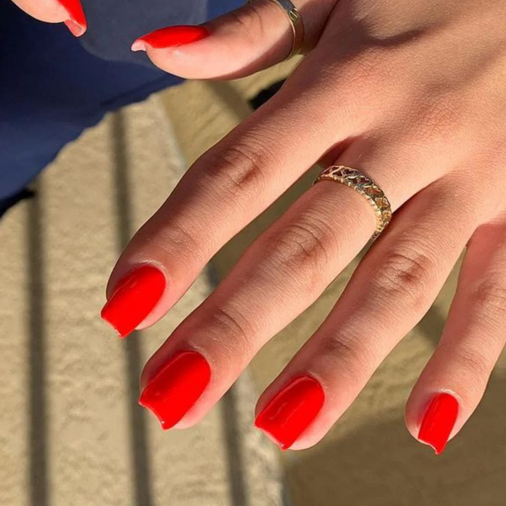 DND Daisy Gel Duo Lava #759 featuring a vibrant gel nail polish and lacquer with a bright, fiery orange shade.