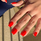 DND Daisy Gel Duo Lava #759 featuring a vibrant gel nail polish and lacquer with a bright, fiery orange shade.