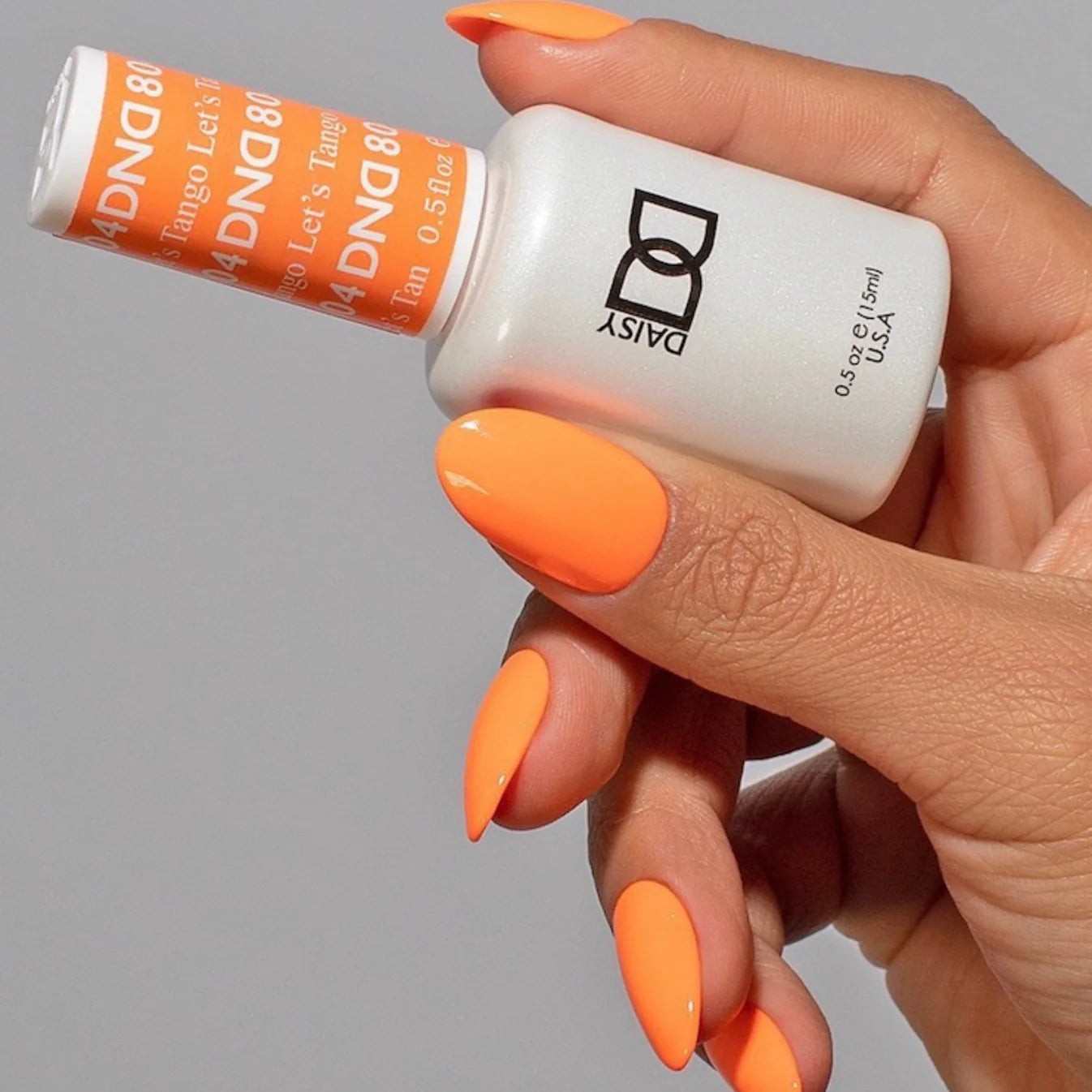 DND Daisy Gel Duo Let's Tango #804 gel nail polish and lacquer swatch showing vibrant pink color on nails