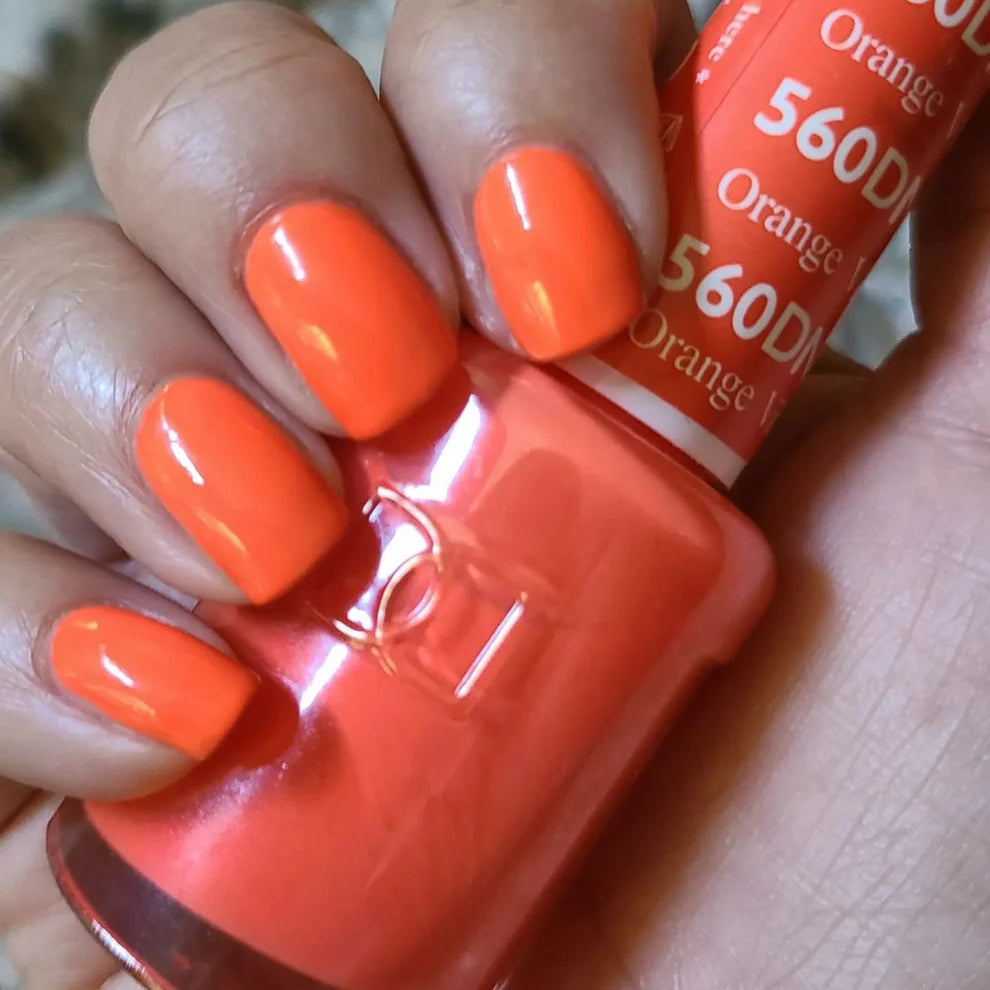 DND Daisy Gel Duo Orange Ville gel nail polish and lacquer swatch showing vibrant orange color and glossy finish.