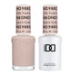 DND Daisy Gel Duo Peach It To Me #988 with peach-colored gel nail polish and lacquer bottles on a white background.