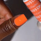 DND Daisy Gel Duo Peaches n Cream #805 featuring a glossy peachy gel nail polish and lacquer.
