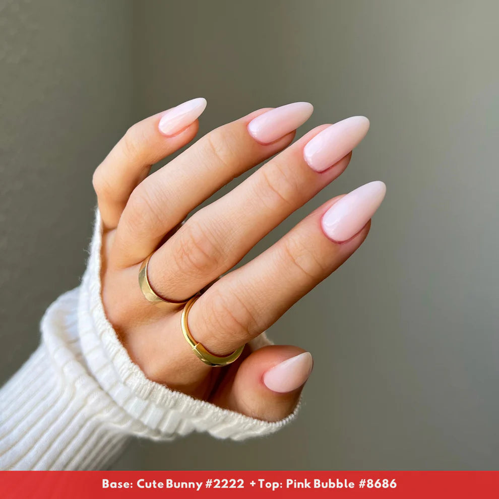 DND Daisy Gel Duo Pink Bubble nail polish and lacquer set with pink and clear gel bottles on a white background.
