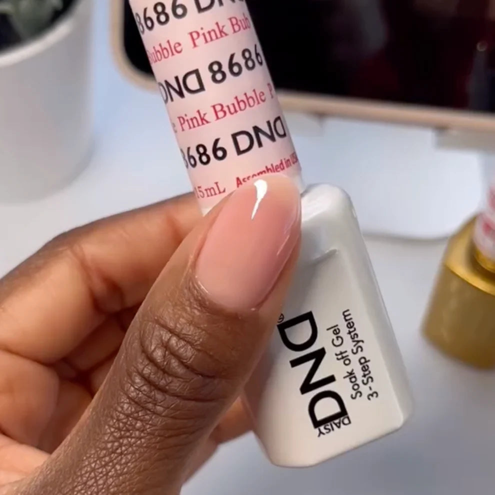 DND Daisy Gel Duo Pink Bubble gel nail polish and lacquer swatch on a nail, showcasing vibrant pink color and glossy finish.