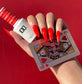 DND Daisy Gel Duo Queen of Hearts #799 featuring vibrant gel nail polish and lacquer in a bold, heart-themed design.