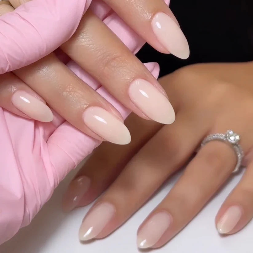 DND Daisy Gel Duo Sandy Nude #858 gel nail polish and lacquer swatch showing a soft nude color on nails