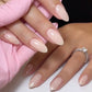 DND Daisy Gel Duo Sandy Nude #858 gel nail polish and lacquer swatch showing a soft nude color on nails