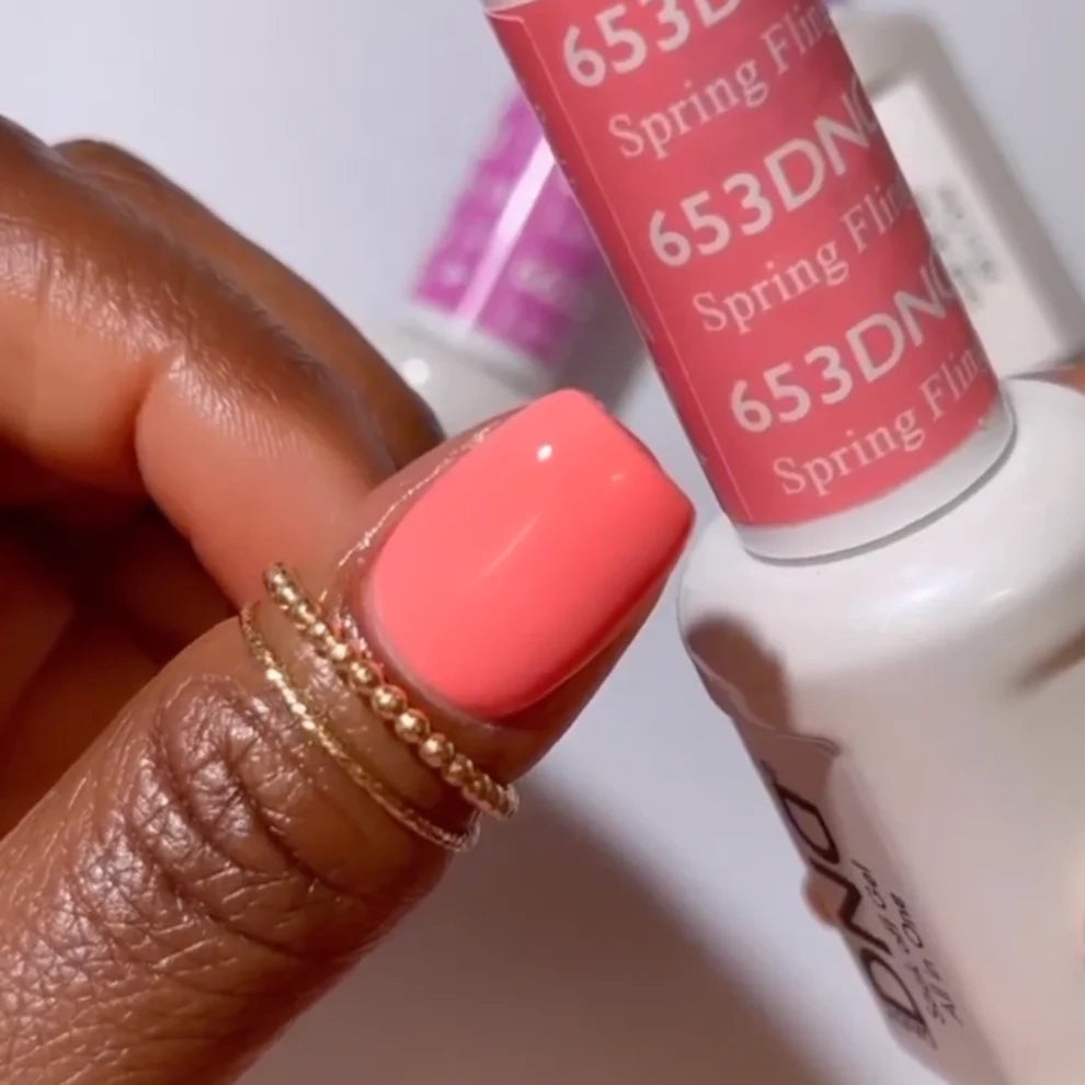 DND Daisy Gel Duo Spring Fling #653 featuring vibrant yellow gel nail polish and lacquer with floral design accents