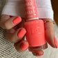 Swatch of DND Daisy Gel Duo Spring Fling #653 with vibrant pink and floral nail polish and lacquer on nails.