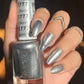 DND Daisy Gel Duo Stormi #777 with swatch of gel nail polish and lacquer in vibrant purple and pink shades