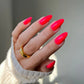 DND Daisy Gel Duo Strawberry Kiss #561 featuring a vibrant pink gel nail polish and lacquer swatch on a nail display