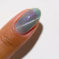 DND DC Gel Polish Cat Eye in Aqua Freckles #19, showcasing a vibrant blue-green gel nail with eye-catching freckles design.