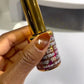 DND DC Gel Polish Cat Eye in shade Cat Wink #35 with a glossy cat eye effect, displayed on a swatch card