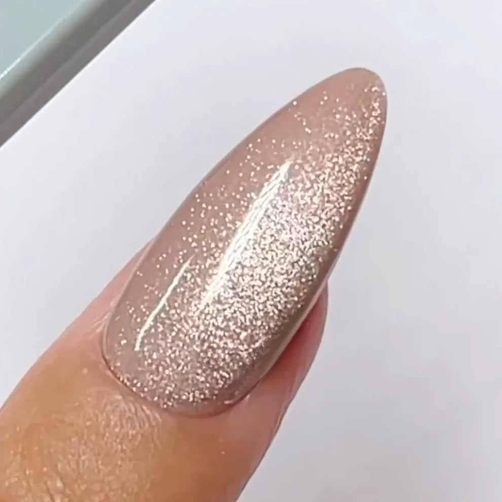 DND DC Gel Polish Catsanova #32 cat eye gel in neutral pink with shimmer and velvet finish on nails.