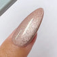 DND DC Gel Polish Catsanova #32 cat eye gel in neutral pink with shimmer and velvet finish on nails.