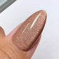 DND DC Gel Polish in Cocoa Whiskers, a velvet cream cat eye shimmer nail polish with a rich brown color and subtle shimmer effect.