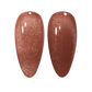 DND DC Gel Polish in Cocoa Whiskers shade, cat eye effect with shimmering brown gel, in a professional nail polish bottle.